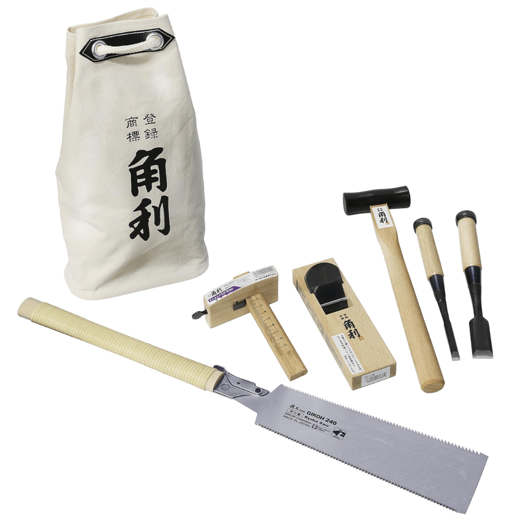 Set of Kakuri traditional Japanese woodworking tools, including a saw, chisels, hammer, and plane, displayed alongside a branded fabric tool bag, showcasing the craftsmanship and precision of Japanese hand tools.